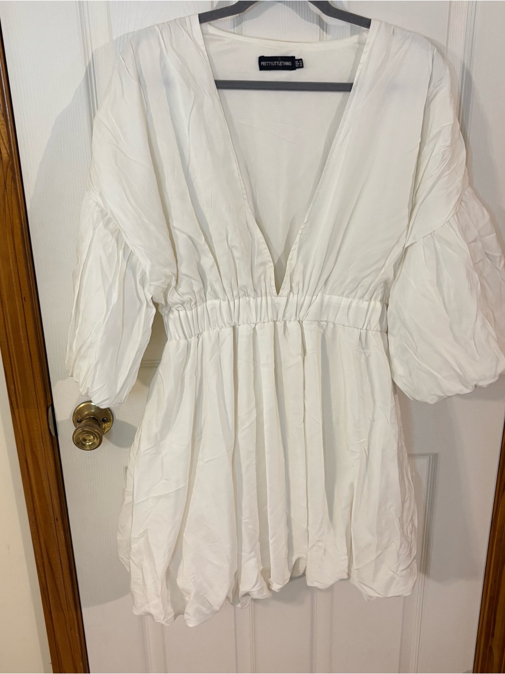 PrettyLittleThing White V-Neck Puff Sleeve Peplum Dress